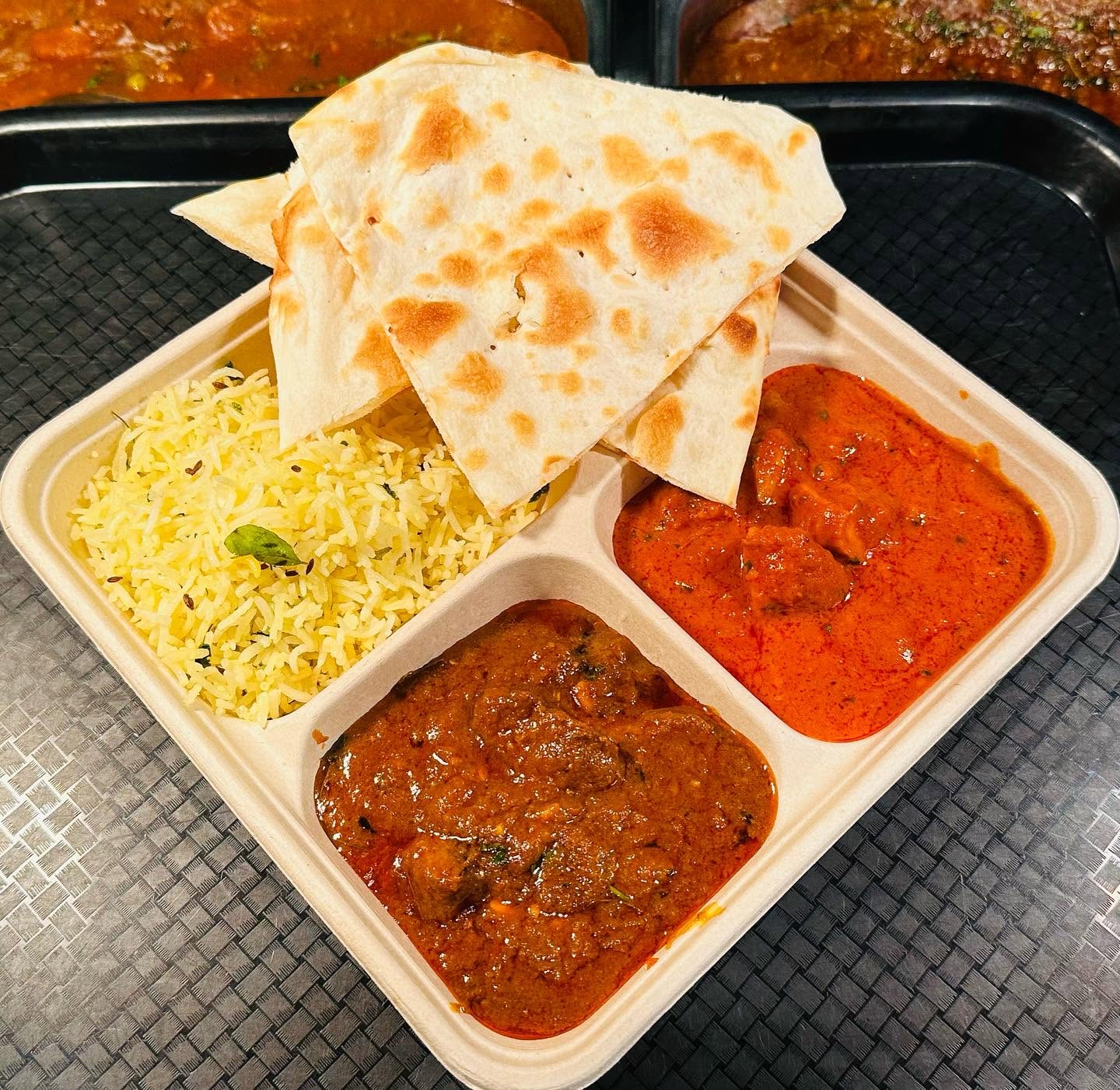 Butter chicken and lamb curry with jeera rice and naan